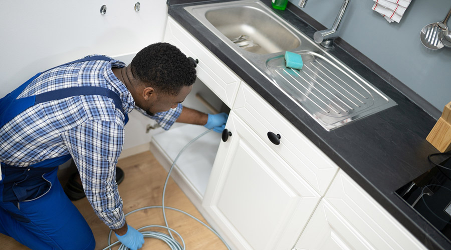 the-plumbing-repair-leaking-sink-pipe